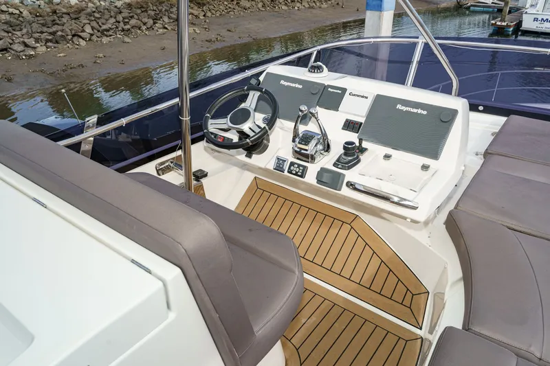 Slide: The Image of Cockpit of a 2018 Prestige 560 yacht. - 4