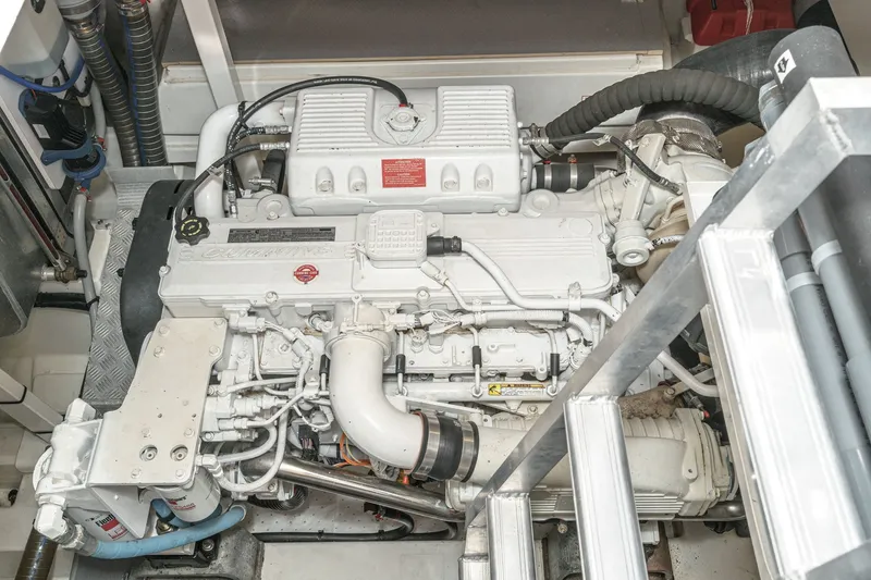 Slide: The Image of Engine room of a 2018 Prestige 560, clean and well-organized. - 43