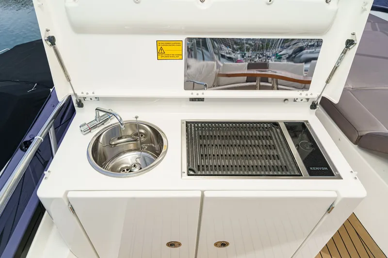 Slide: The Image of Kitchenette on a 2018 Prestige 560 yacht. - 7