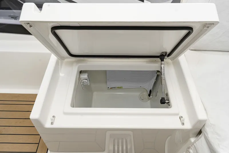 Slide: The Image of Open storage compartment on 2018 Prestige 560 yacht. - 8