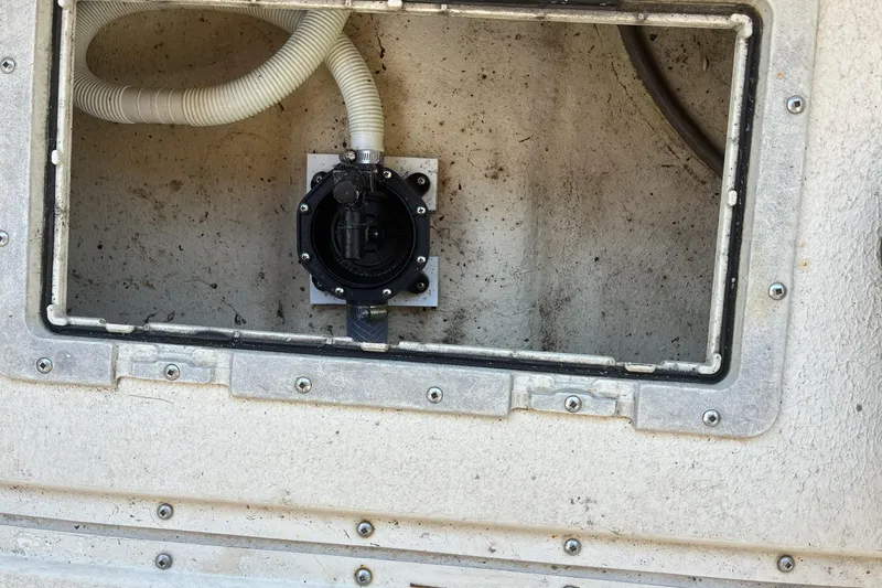 Slide: The Image of Boat compartment with hose and valve, Rosborough 246, 1999 model. - 12