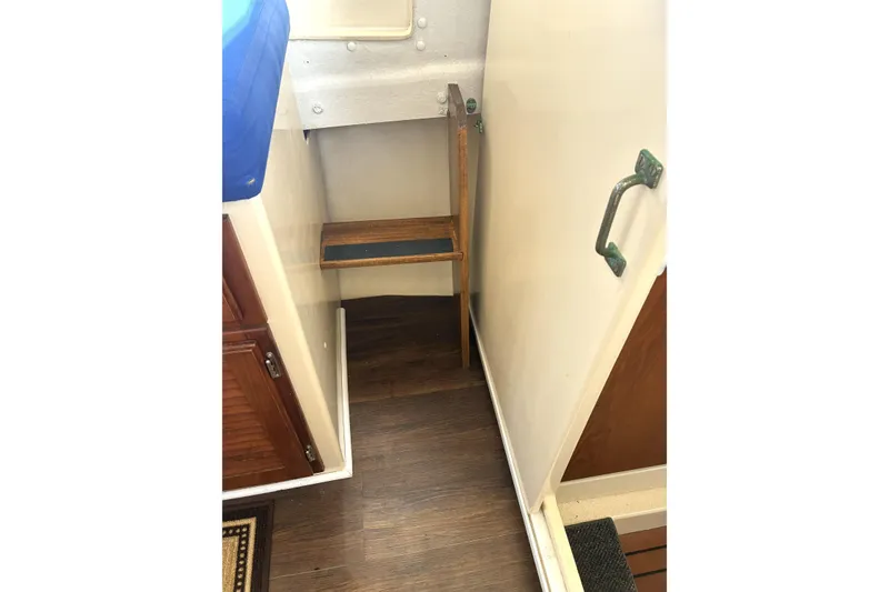 Slide: The Image of Interior of 1999 Rosborough 246 boat with wooden step and handle. - 6