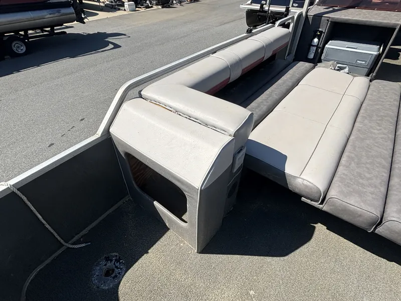 Slide: The Image of Interior of a 1990 Sun Tracker Party Hut 28 with gray seating. - 15