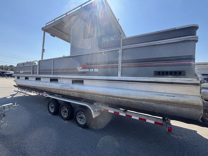 Slide: The Image of 1990 Sun Tracker Party Hut 28 pontoon boat on trailer. - 5