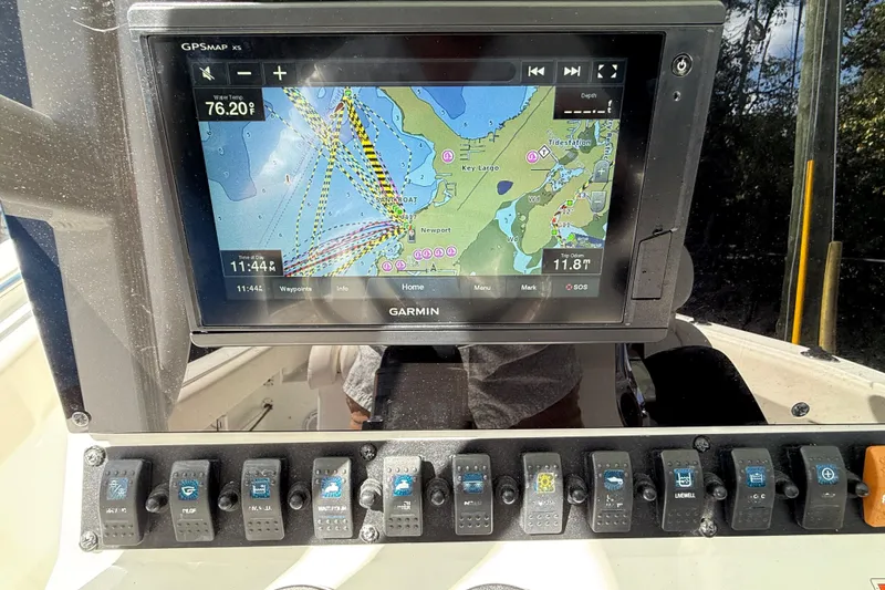 Slide: The Image of Garmin GPS display on 2020 Sea Hunt Ultra 225 boat dashboard. - 14