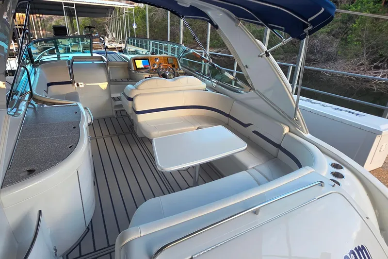 Slide: The Image of 2007 Formula 370 Super Sport boat interior with seating and control panel. - 12