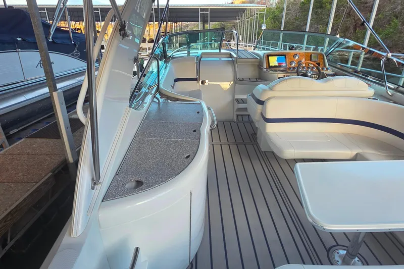 Slide: The Image of 2007 Formula 370 Super Sport boat interior with seating and control panel. - 14