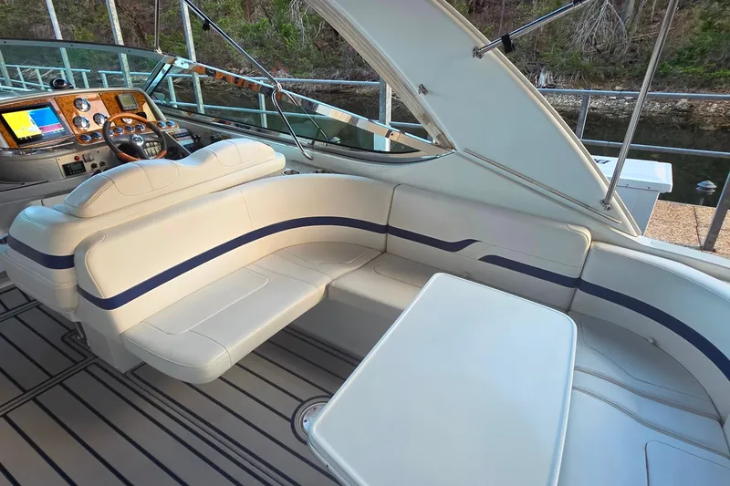 Slide: The Image of Luxurious interior of 2007 Formula 370 Super Sport boat with plush seating and modern dashboard. - 15