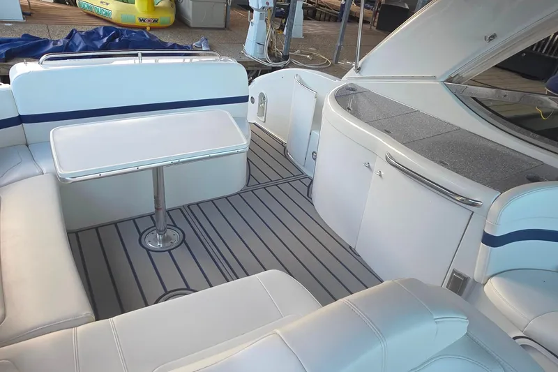 Slide: The Image of 2007 Formula 370 Super Sport boat interior with seating and table. - 22