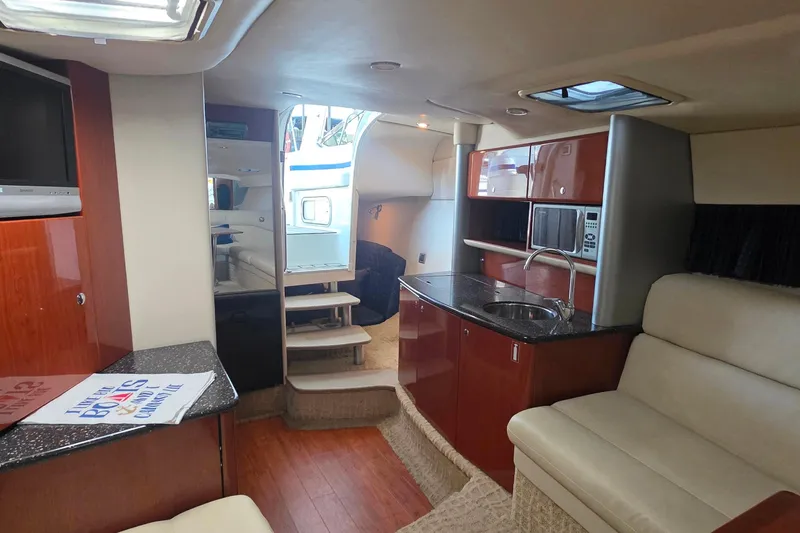 Slide: The Image of Interior of 2007 Formula 370 Super Sport yacht with modern amenities and sleek design. - 32