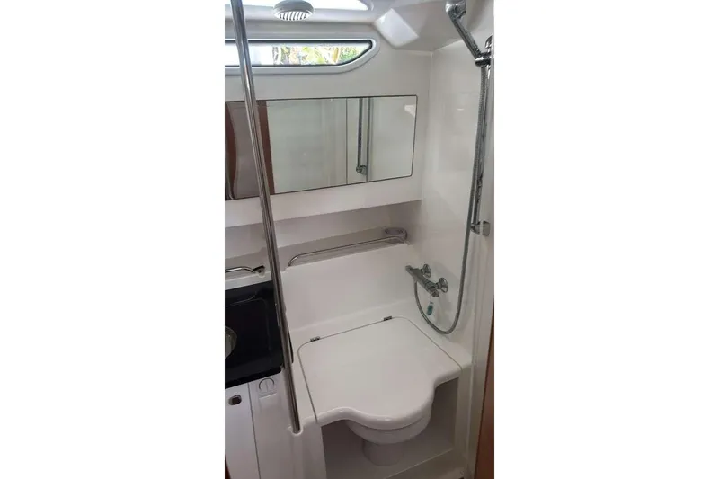 Slide: The Image of Compact bathroom in 2021 Nimbus T11 boat with shower and mirror. - 9