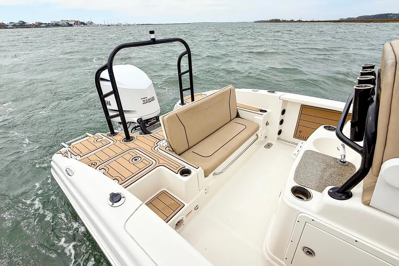 Slide: The Image of 2020 NauticStar 251 Hybrid boat with Yamaha engine on open water. - 15