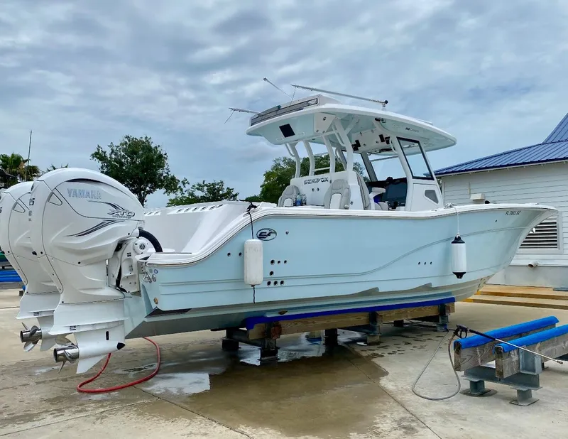 The Image of 2021 Sea Fox 368 Commander boat with twin Yamaha engines on a dock. - 0