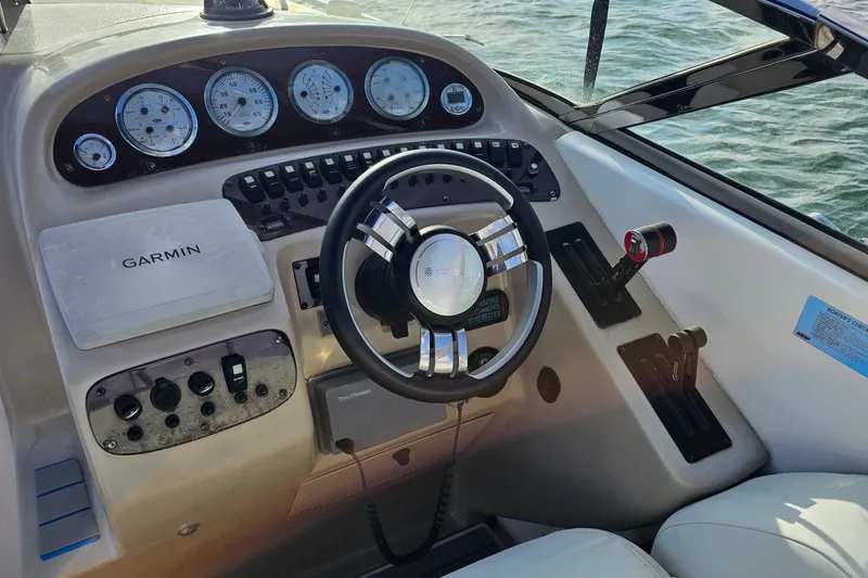 Slide: The Image of Steering console of 2002 Chaparral 285 SSi boat with Garmin navigation system. - 12