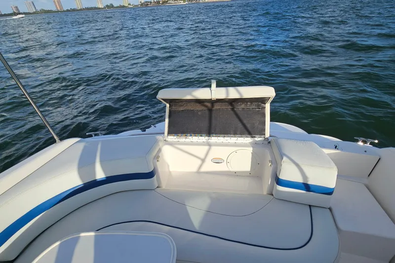 Slide: The Image of 2002 Chaparral 285 SSi boat interior with seating, open water view. - 23