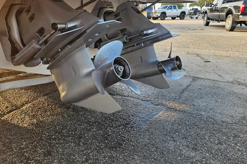 Slide: The Image of Dual propellers of a 2002 Chaparral 285 SSi boat on a trailer. - 33