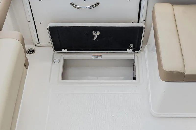 Slide: The Image of Interior cabin of a 2020 Sailfish 245 DC boat with storage and seating. - 13