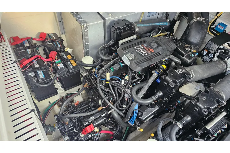 Slide: The Image of Engine compartment of 2008 Sea Ray Sundancer 310 with batteries and wiring. - 30