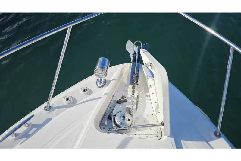 Slide: The Image of Bow of 2008 Sea Ray Sundancer 310 with anchor and railing in sunlight. - 39