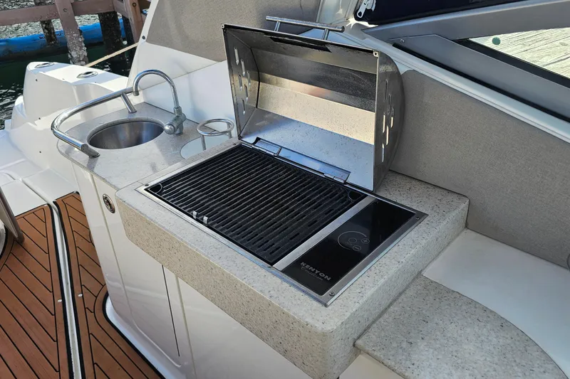 Slide: The Image of Outdoor kitchen on 2008 Sea Ray Sundancer 310 yacht with grill and sink. - 49