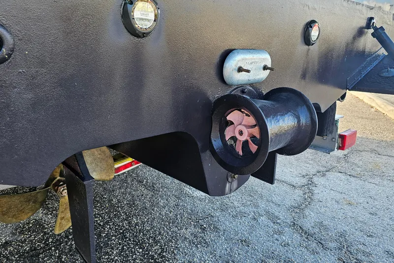 Slide: The Image of 2008 Sea Ray Sundancer 310 boat stern with propeller and thruster detail. - 64