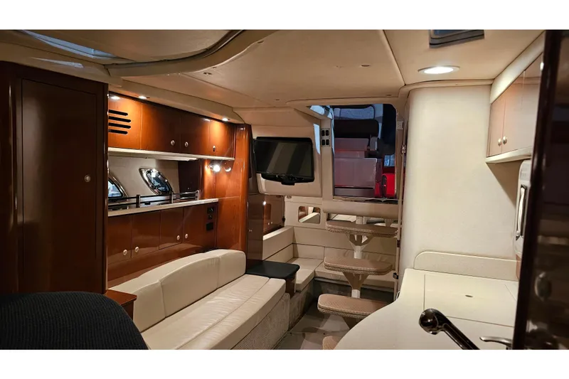 Slide: The Image of Luxurious interior of 2008 Sea Ray Sundancer 310 yacht with elegant wood finishes. - 70