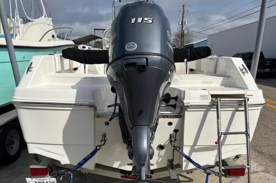 Slide: The Image of 2018 Robalo R180 Center Console boat with 115 HP outboard motor, rear view. - 4