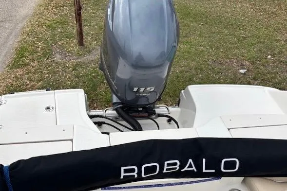 Slide: The Image of 2018 Robalo R180 Center Console boat with Yamaha 115 engine, outdoor setting. - 6
