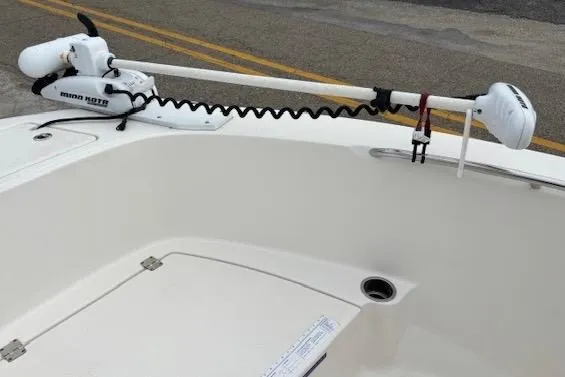 Slide: The Image of 2018 Robalo R180 Center Console with Minn Kota trolling motor on deck. - 9