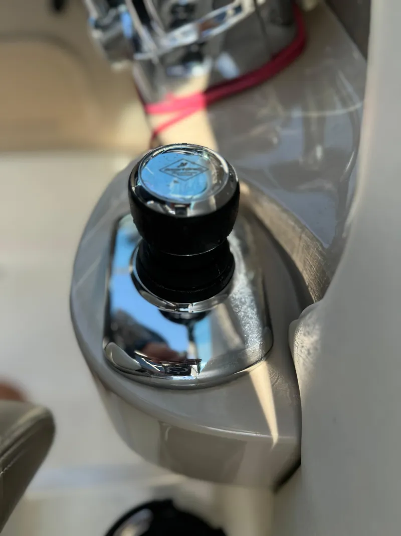Slide: The Image of Close-up of 2013 Sea Ray 300 SLX boat control knob. - 6