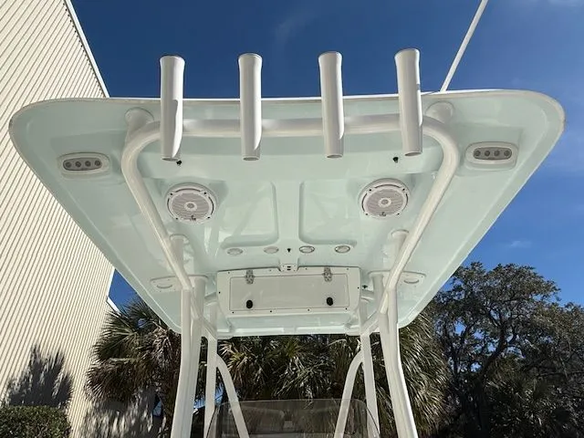 Slide: The Image of 2019 Sea Hunt Ultra 211 boat top view with rod holders. - 13