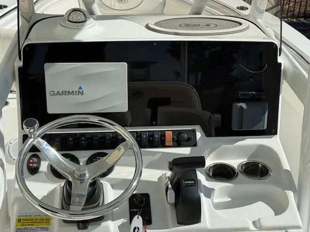 Slide: The Image of 2019 Sea Hunt Ultra 211 boat dashboard with Garmin system. - 4