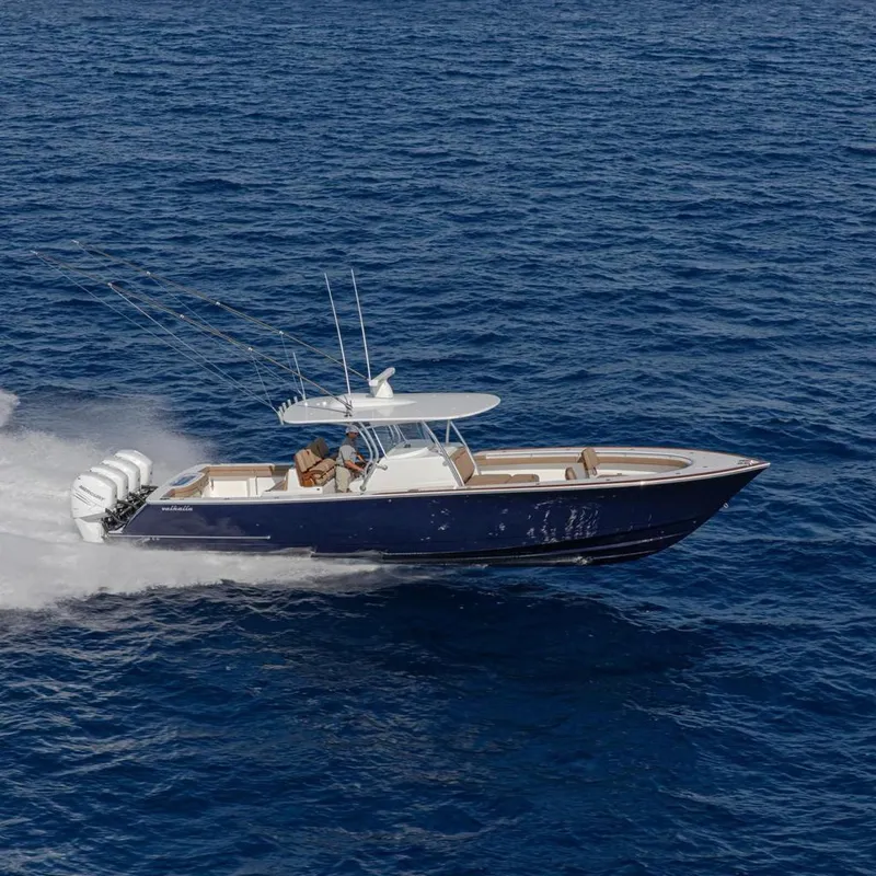 The Image of 2026 Valhalla Boatworks V-41 displayed indoors, showcasing sleek design and powerful engines. - 0