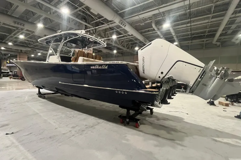 Slide: The Image of 2026 Valhalla Boatworks V-41 displayed indoors, showcasing sleek design and craftsmanship. - 13