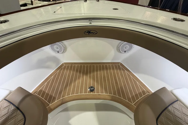 Slide: The Image of 2026 Valhalla Boatworks V-41 interior with teak flooring and cushioned seating. - 3
