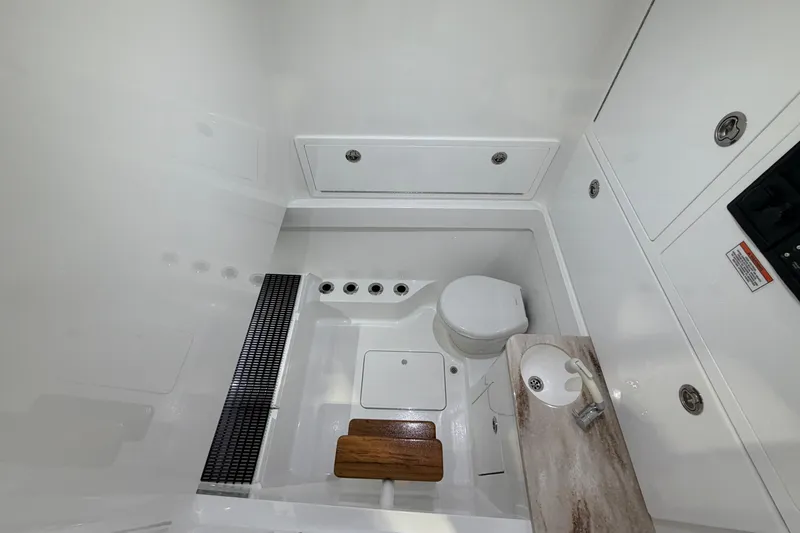 Slide: The Image of 2026 Valhalla Boatworks V-41 interior bathroom with modern fixtures and compact design. - 7