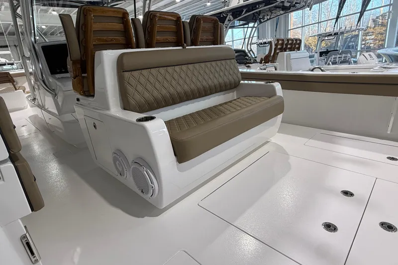 Slide: The Image of 2026 Valhalla Boatworks V-41 interior with brown leather seating and modern design. - 9