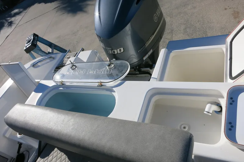 Slide: The Image of 2021 Sea Pro 239 Deep V CC boat with Yamaha 300 engine and livewell compartments. - 10