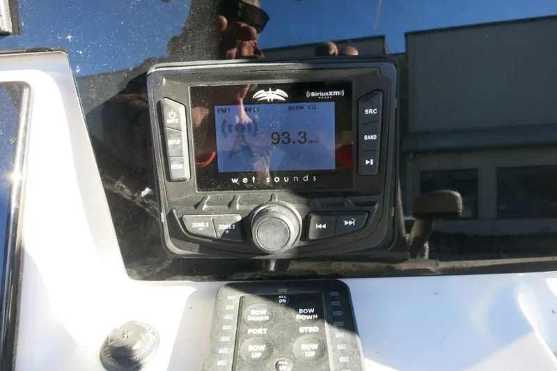 Slide: The Image of Wet Sounds audio system on 2021 Sea Pro 239 Deep V CC boat dashboard. - 16