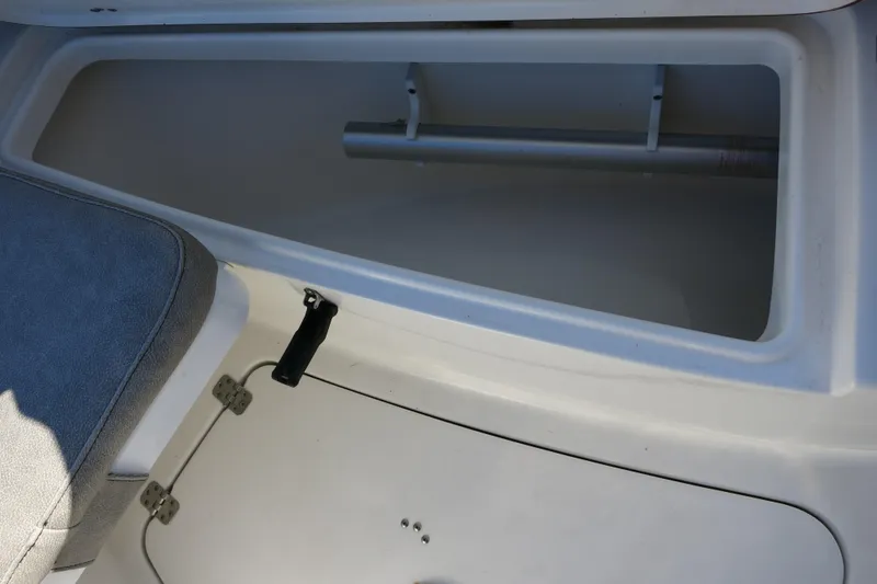 Slide: The Image of 2021 Sea Pro 239 Deep V CC storage compartment with cushioned seating. - 23