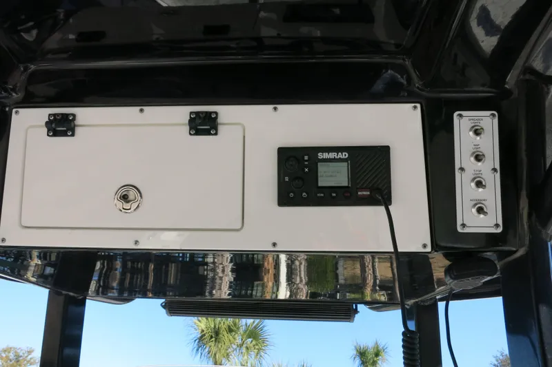 Slide: The Image of 2021 Sea Pro 239 Deep V CC boat console with Simrad electronics and control panel. - 30