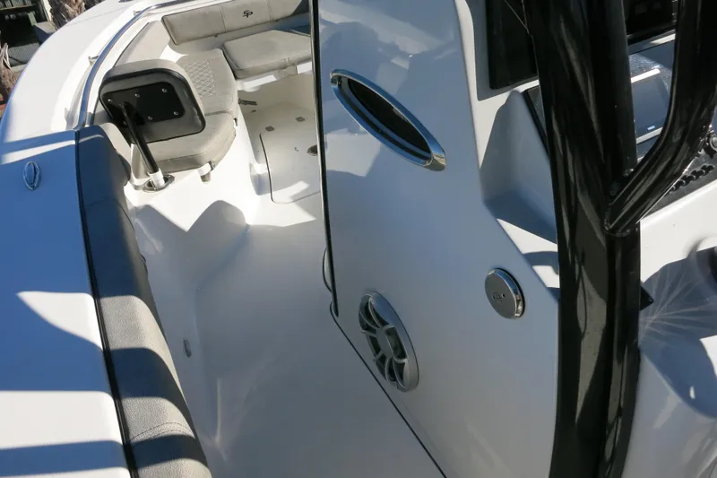Slide: The Image of 2021 Sea Pro 239 Deep V CC boat interior with seating and console details. - 32