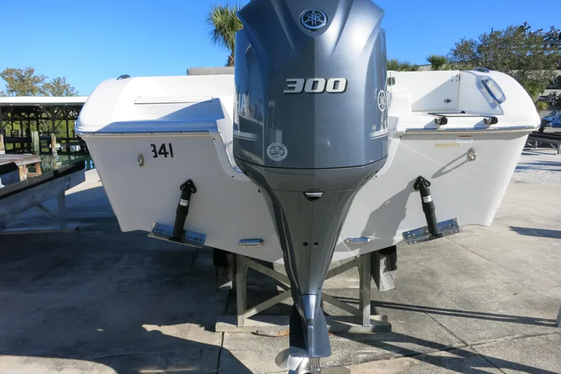 Slide: The Image of 2021 Sea Pro 239 Deep V CC boat with Yamaha 300 engine, docked outdoors. - 34