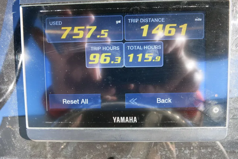 Slide: The Image of Yamaha display showing fuel usage, trip distance, and hours for 2021 Sea Pro 239 Deep V CC. - 36