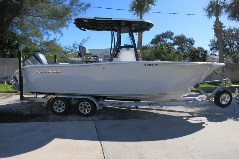 Slide: The Image of 2021 Sea Pro 239 Deep V CC boat on trailer, parked outdoors. - 40