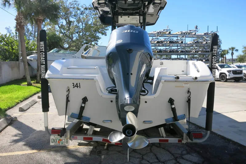 Slide: The Image of 2021 Sea Pro 239 Deep V CC boat with powerful outboard motor on trailer. - 44