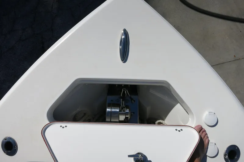 Slide: The Image of Bow of 2021 Sea Pro 239 Deep V CC with anchor storage compartment. - 58