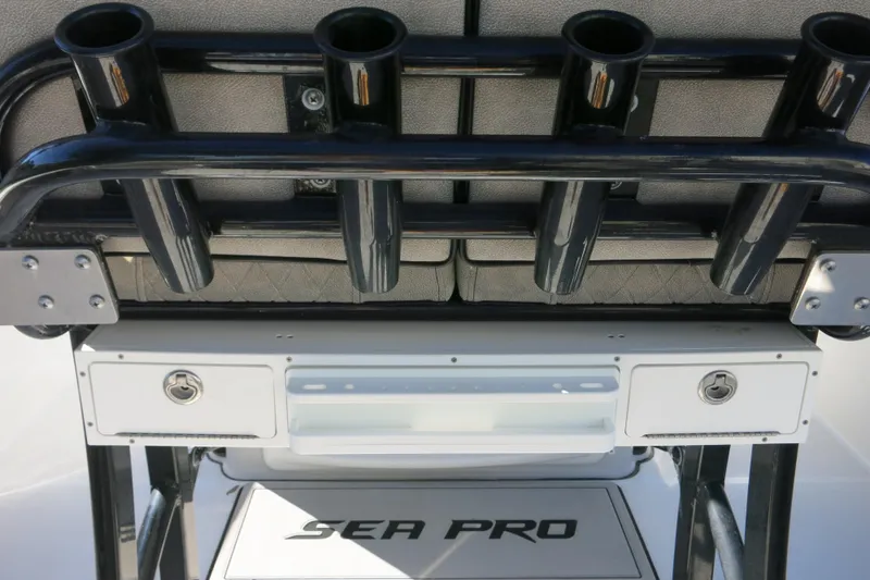 Slide: The Image of 2021 Sea Pro 239 Deep V CC boat with rod holders and storage compartments. - 62