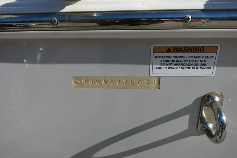 Slide: The Image of 2021 Sea Pro 239 Deep V CC boat with warning label and serial number. - 8