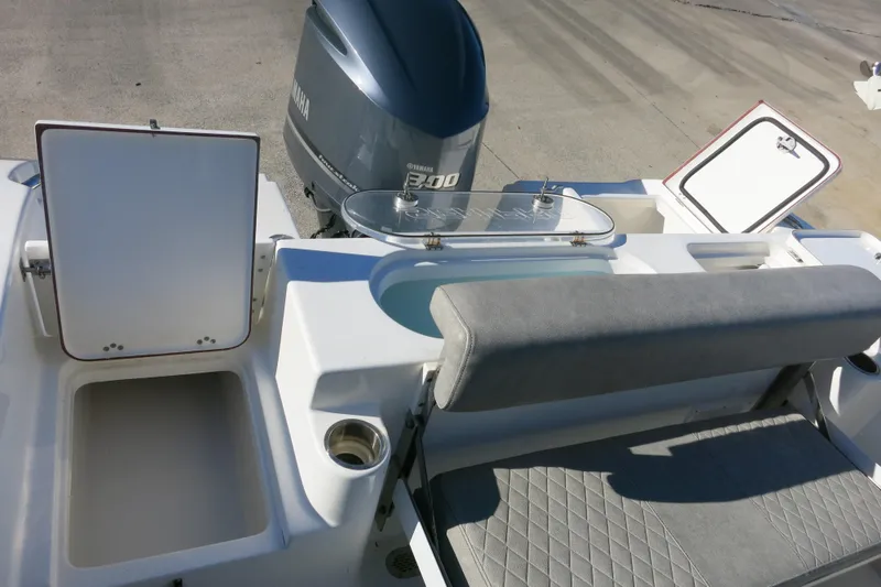 Slide: The Image of 2021 Sea Pro 239 Deep V CC boat with Yamaha engine, open storage compartments. - 9